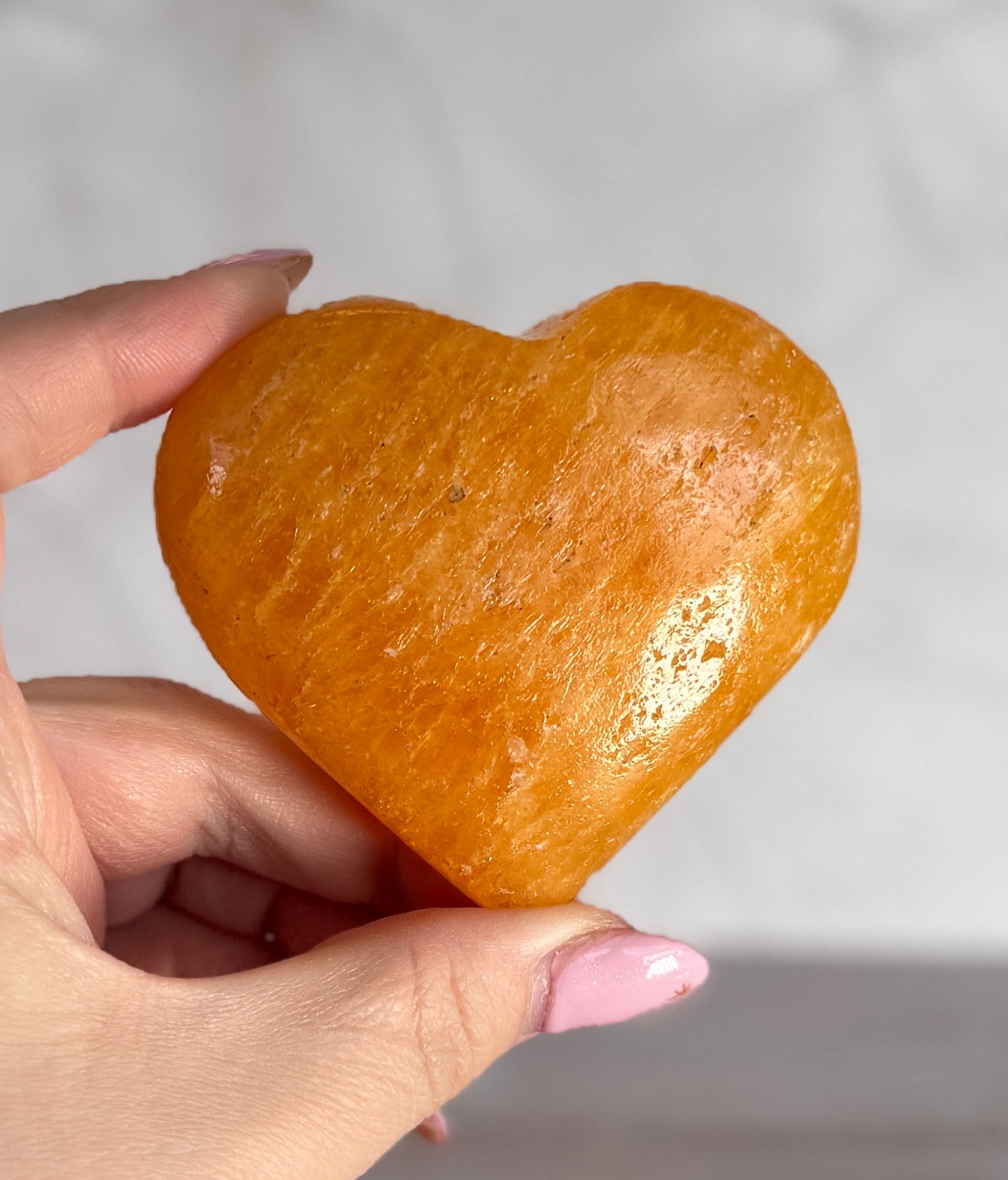 ORANGE CALCITE HEART – 206g – 3.5" x 3"